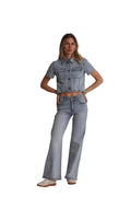 Completo in jeans con pioggia di strass